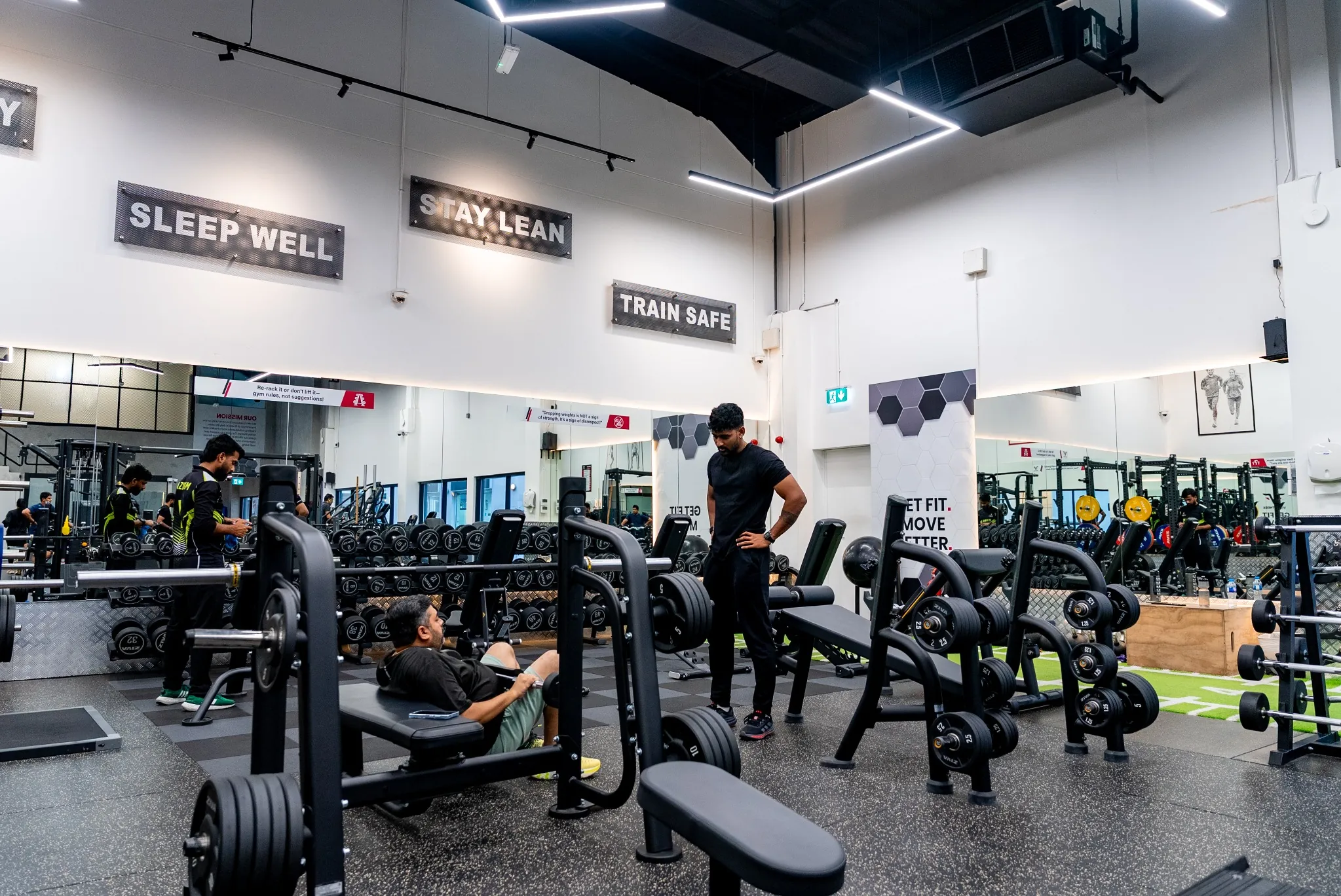 Fitness District dumbbell and free weights area